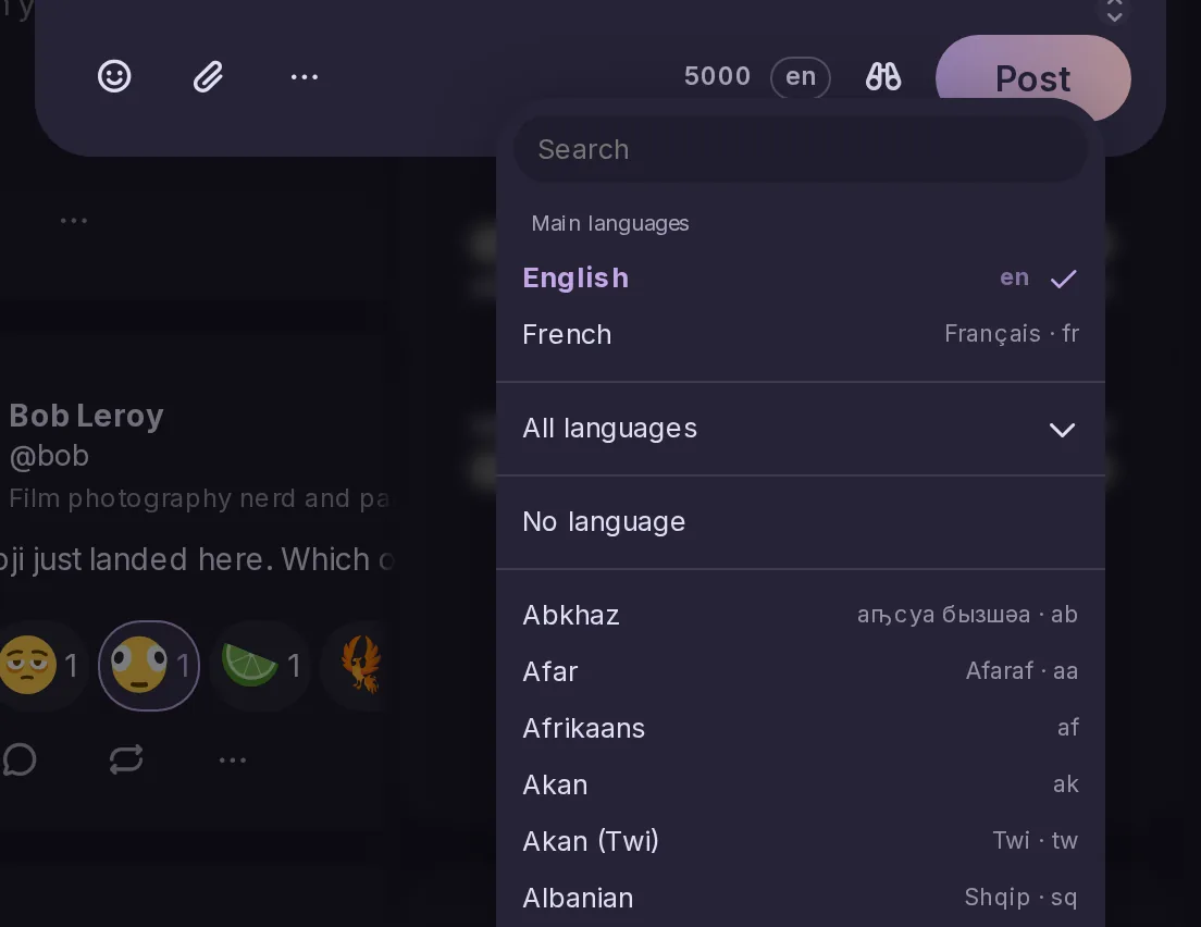 The composer's language pill opened on a searchable list of languages, with No language first and the author's languages at the top.